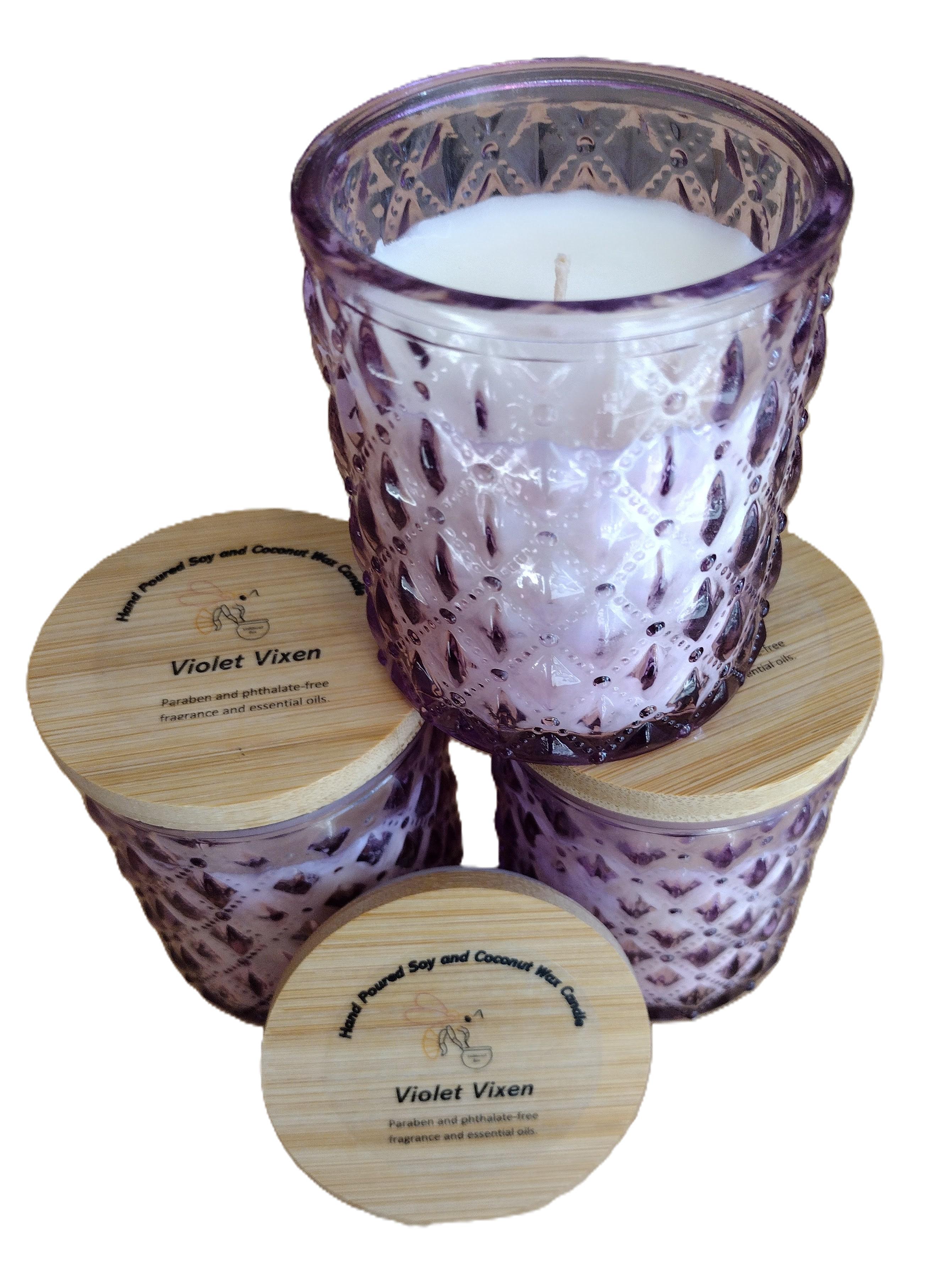 candle in lavender glass jar with bamboo lid