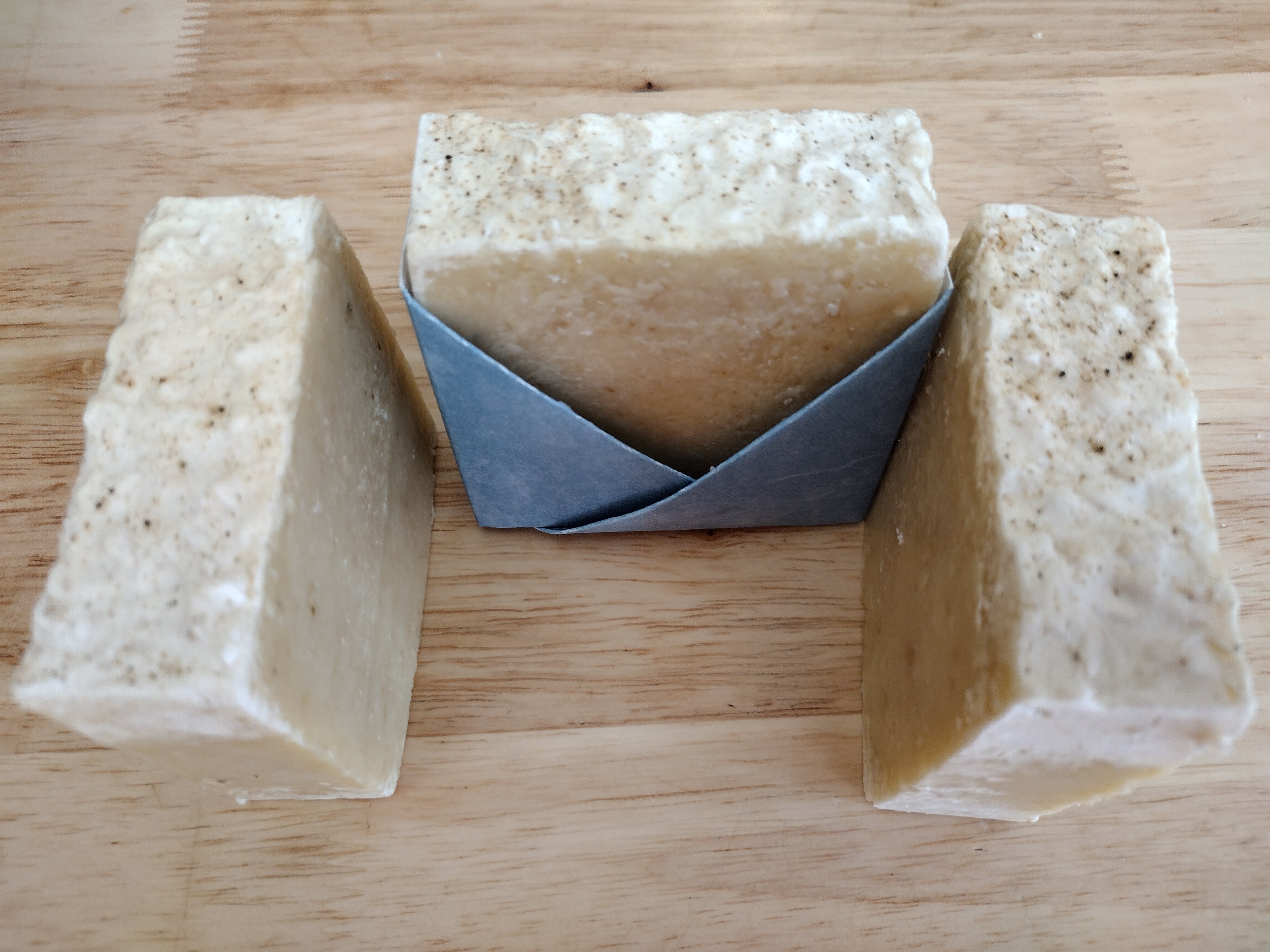 square beige soap in blue wrapper