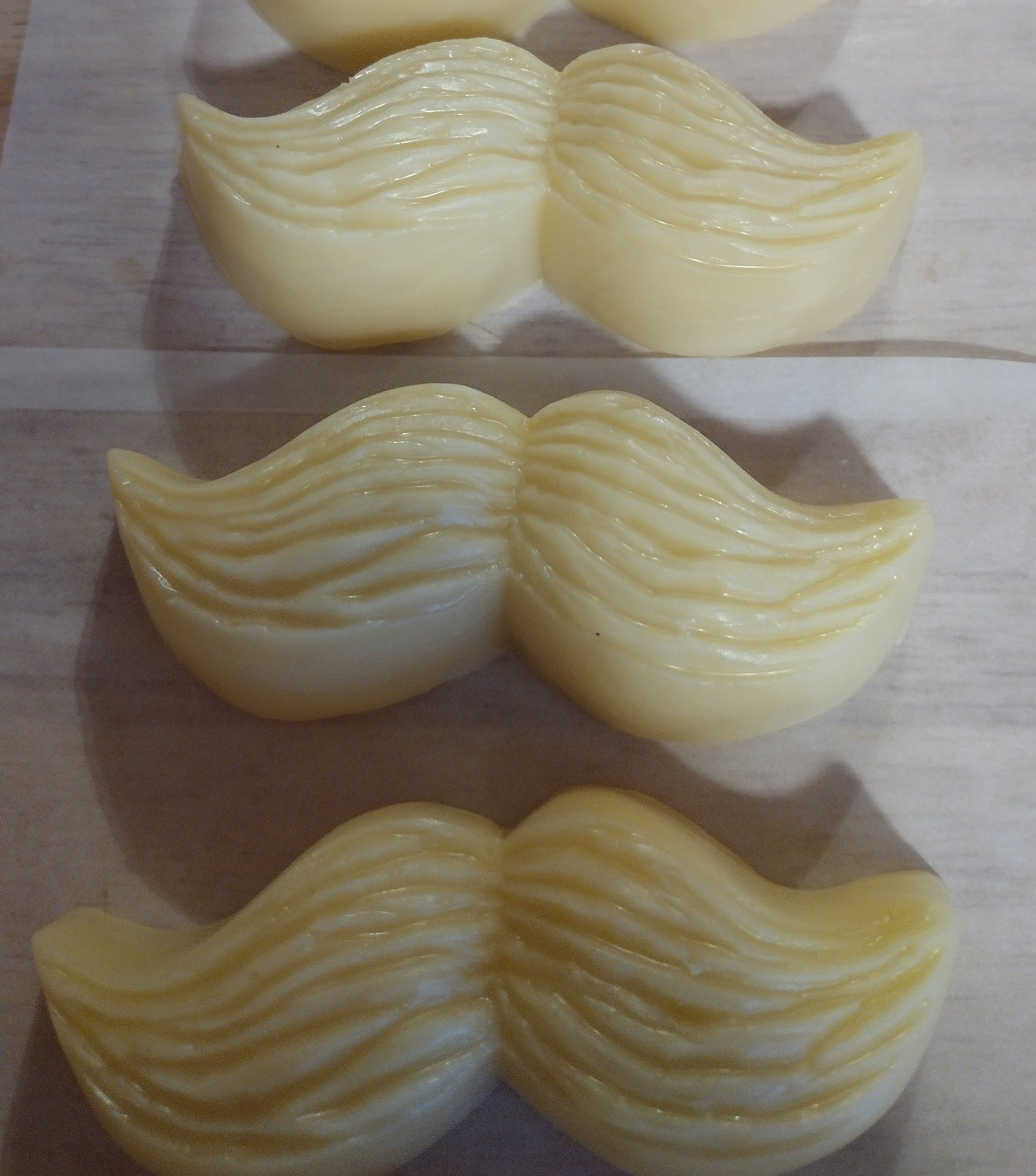 handlebar mustache-shaped massage bars
